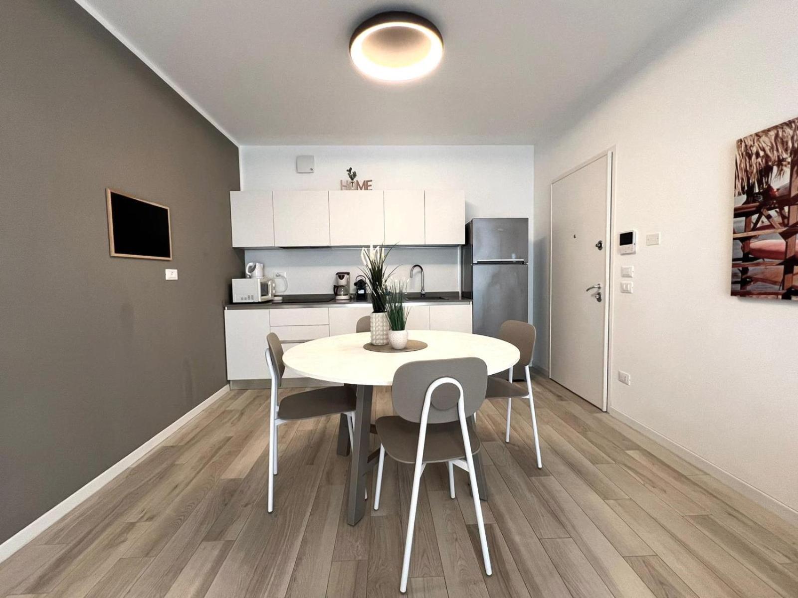 Sun Beach Residence Con Piscina - Piazza Brescia - Adria Holiday Jesolo - Family Apartments Room photo